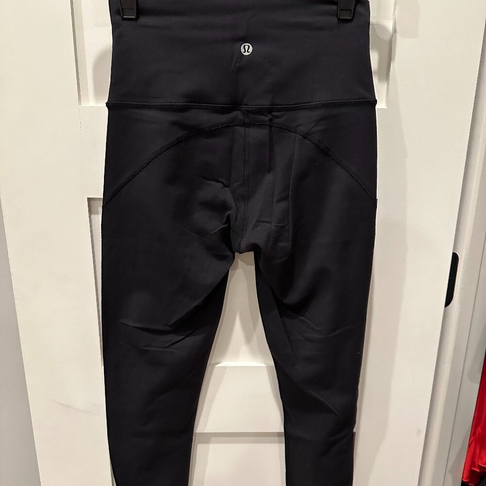 Lululemon Size 4 Leggings with Pinholes